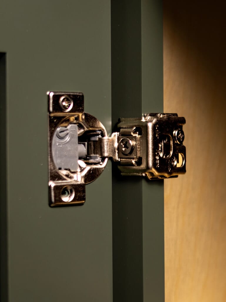 KOVILLE RTA cabinetry with metal-to-metal connector showing premium cabinet carcase construction