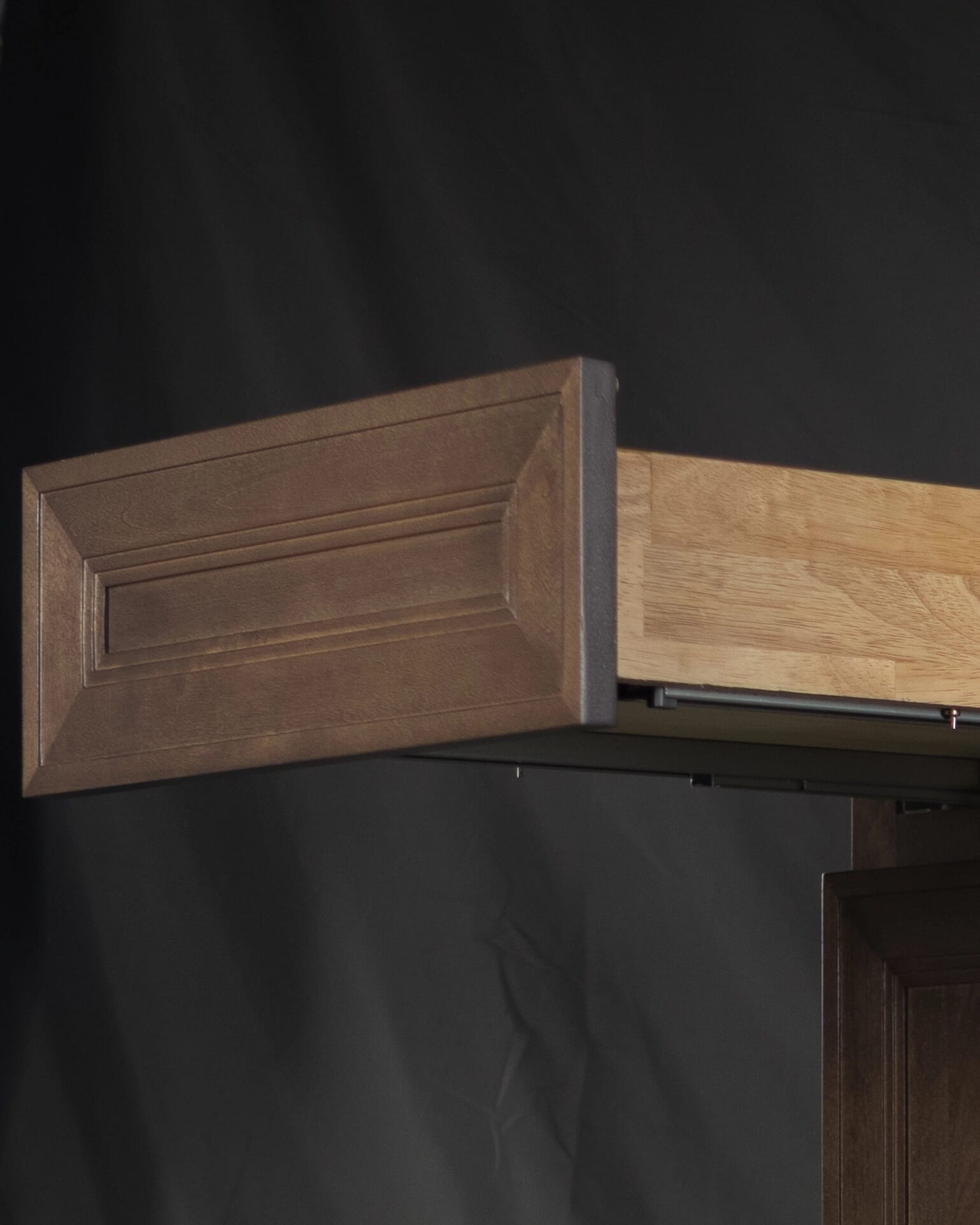 Close-up detail of Tuscany cabinet drawer face showing clean edges, smooth finish, and refined craftsmanship