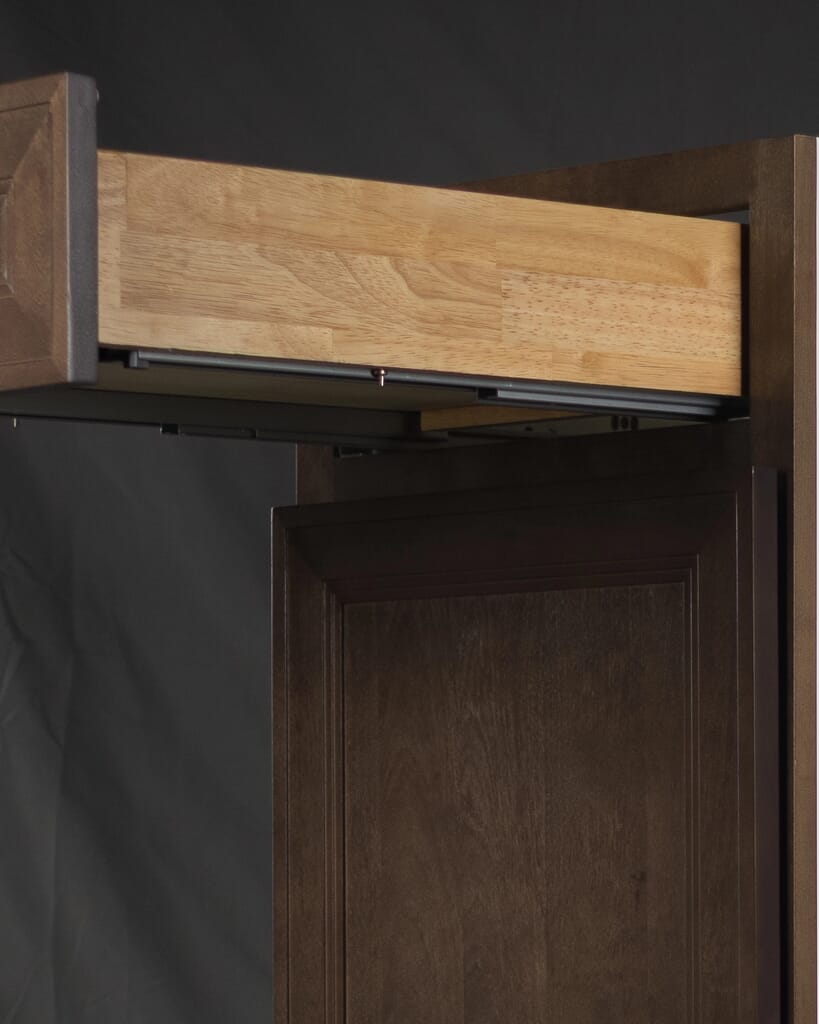 Close-up view of a Tuscany cabinet drawer box featuring full dovetail joinery